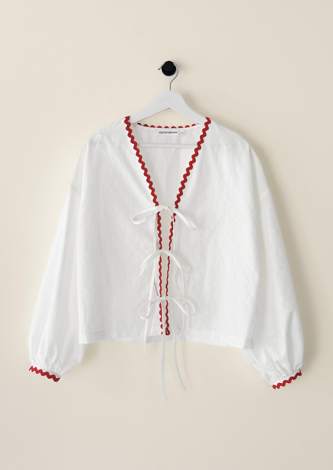 Blouse à nouer avec bordures contrastantes