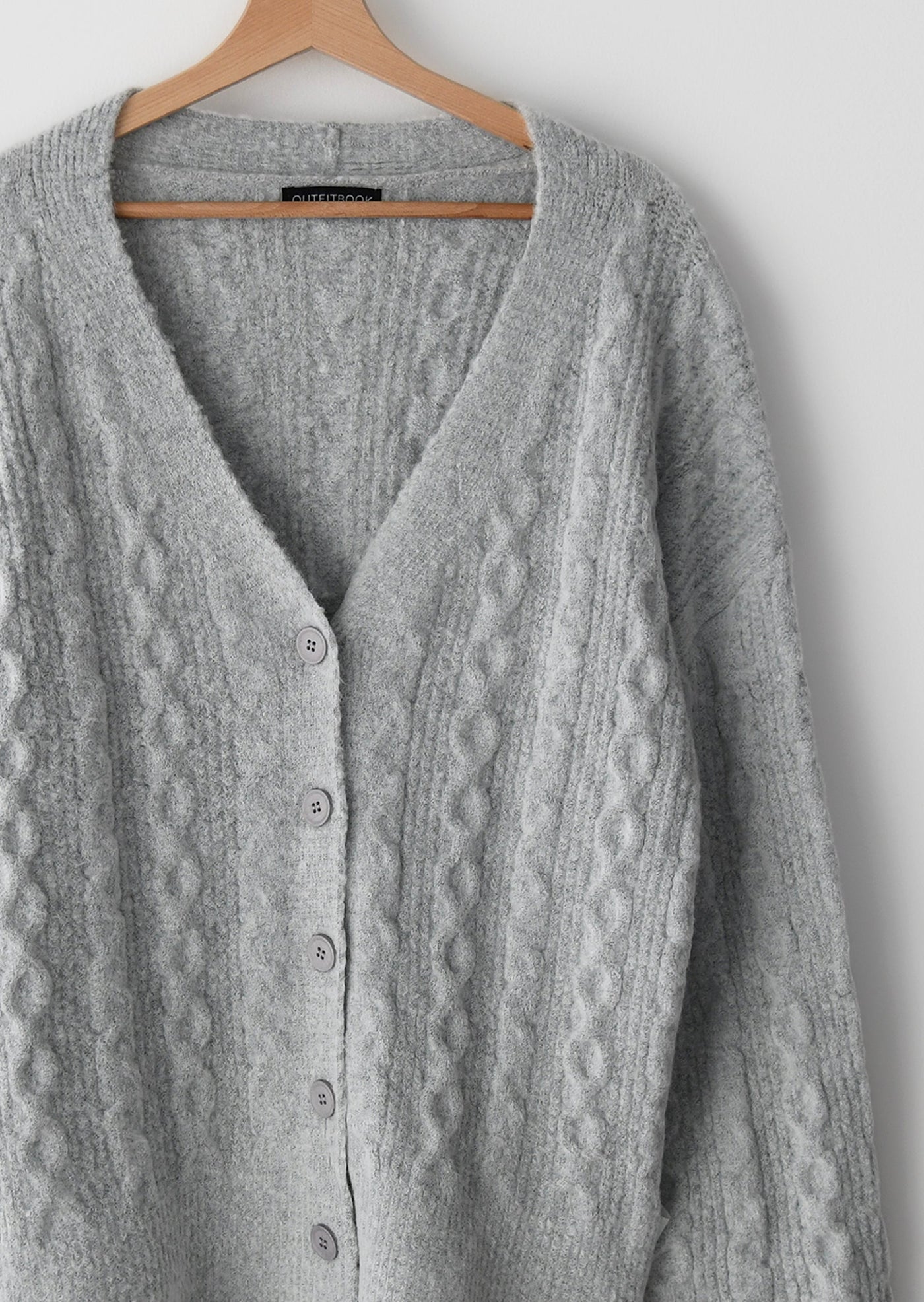 Cardigan en maille torsadé gris