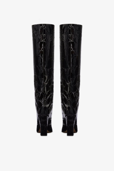 Knee-high boots in black patent soft croco-embossed leather