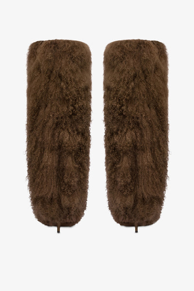 Boots in brown faux fur