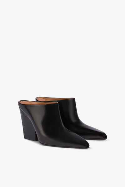 Long, pointed mule boots in soft black brushed leather