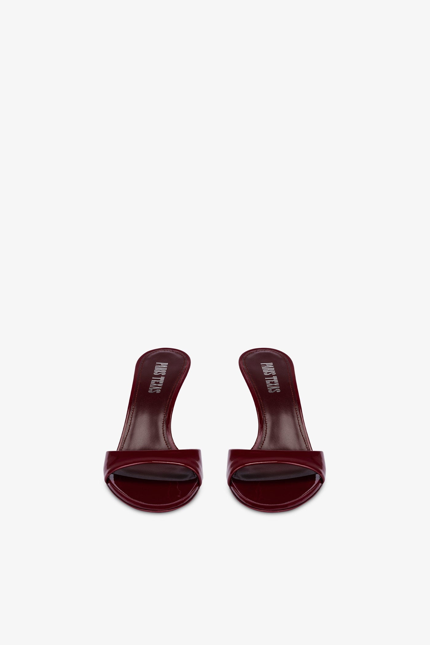 Almond-toe mules in patent rouge noir leather