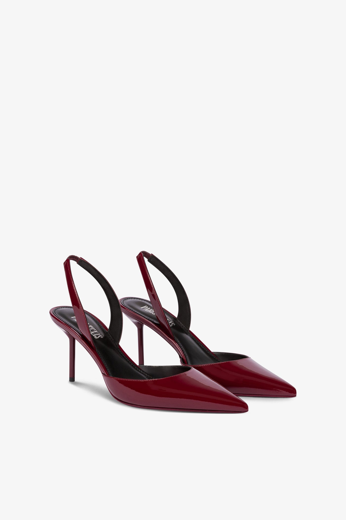 Long, pointed slingbacks in patent rouge noir leather