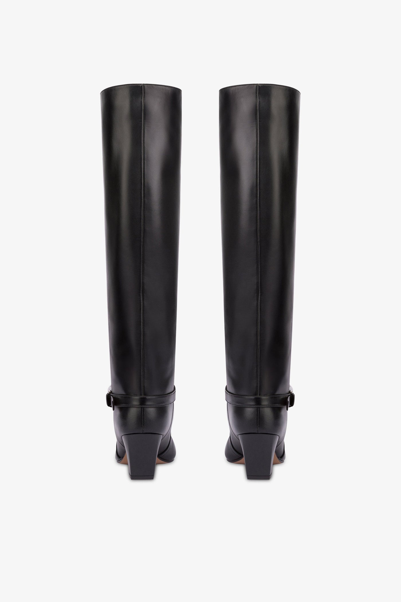 Long, pointed knee-high boots in smooth black leather