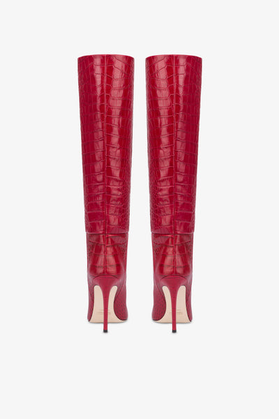 Pointed knee-high boots in red soft croco-embossed leather