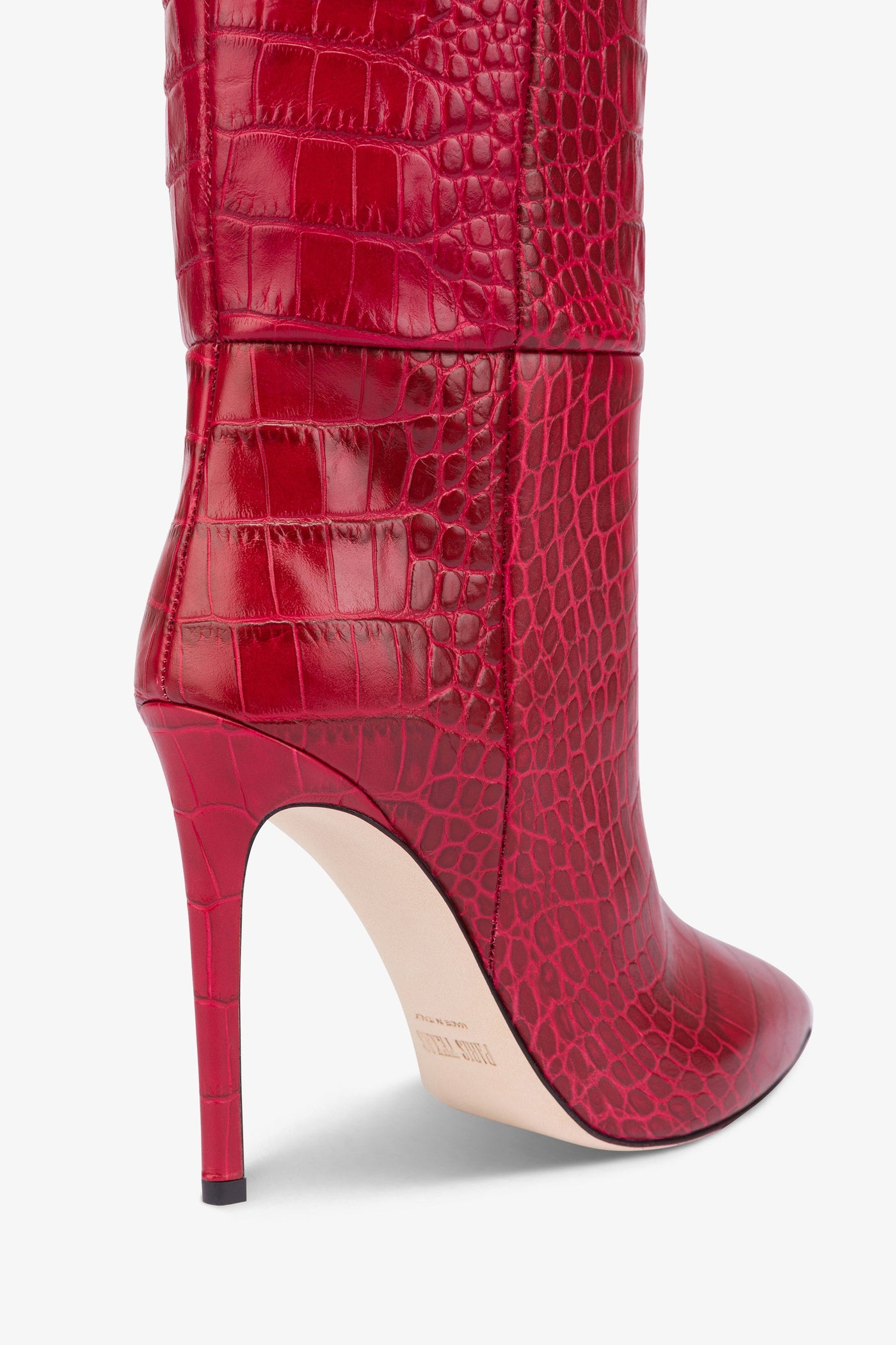 Pointed knee-high boots in red soft croco-embossed leather