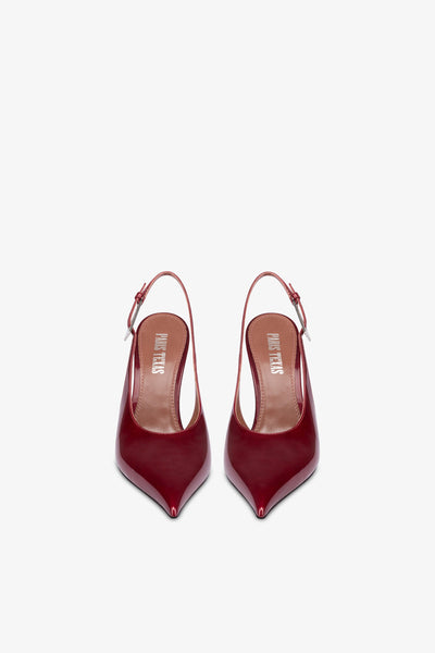 Sharp, pointed slingback pumps in patent pinot noir glossy leather