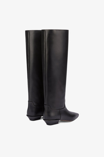 Knee-high boots in smooth black leather