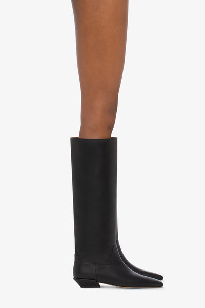 Knee-high boots in smooth black leather