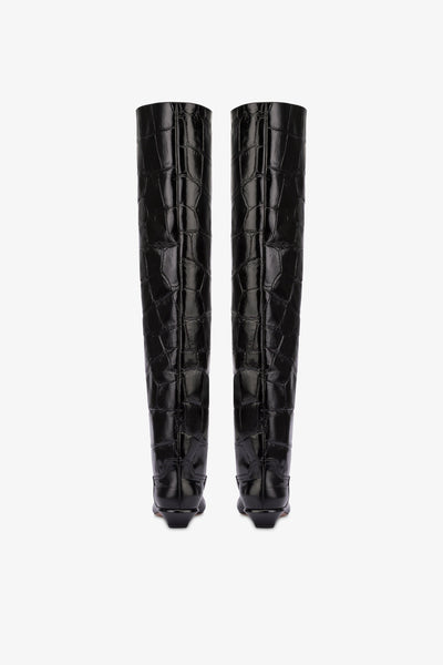 Over-the-knee boots in black croco-embossed leather