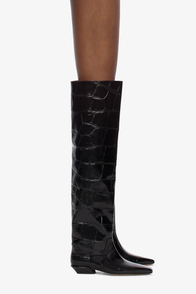 Over-the-knee boots in black croco-embossed leather