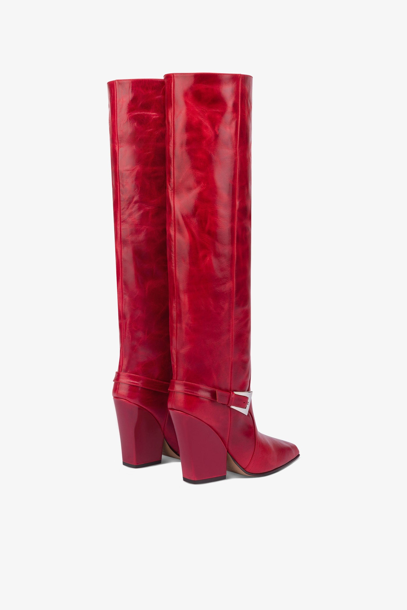 Tall, knee-high boots in shiny fiesta vintage leather