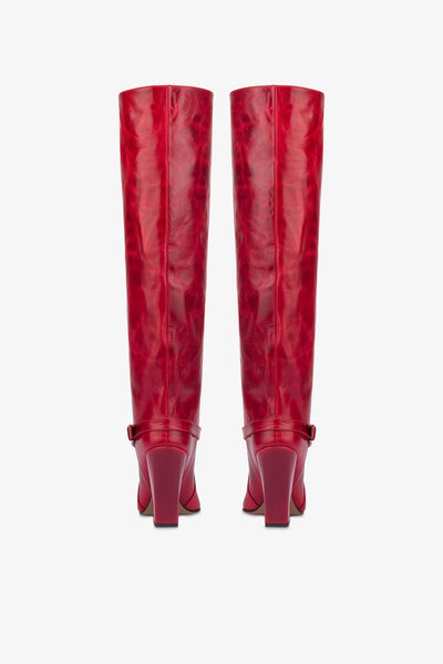 Tall, knee-high boots in shiny fiesta vintage leather