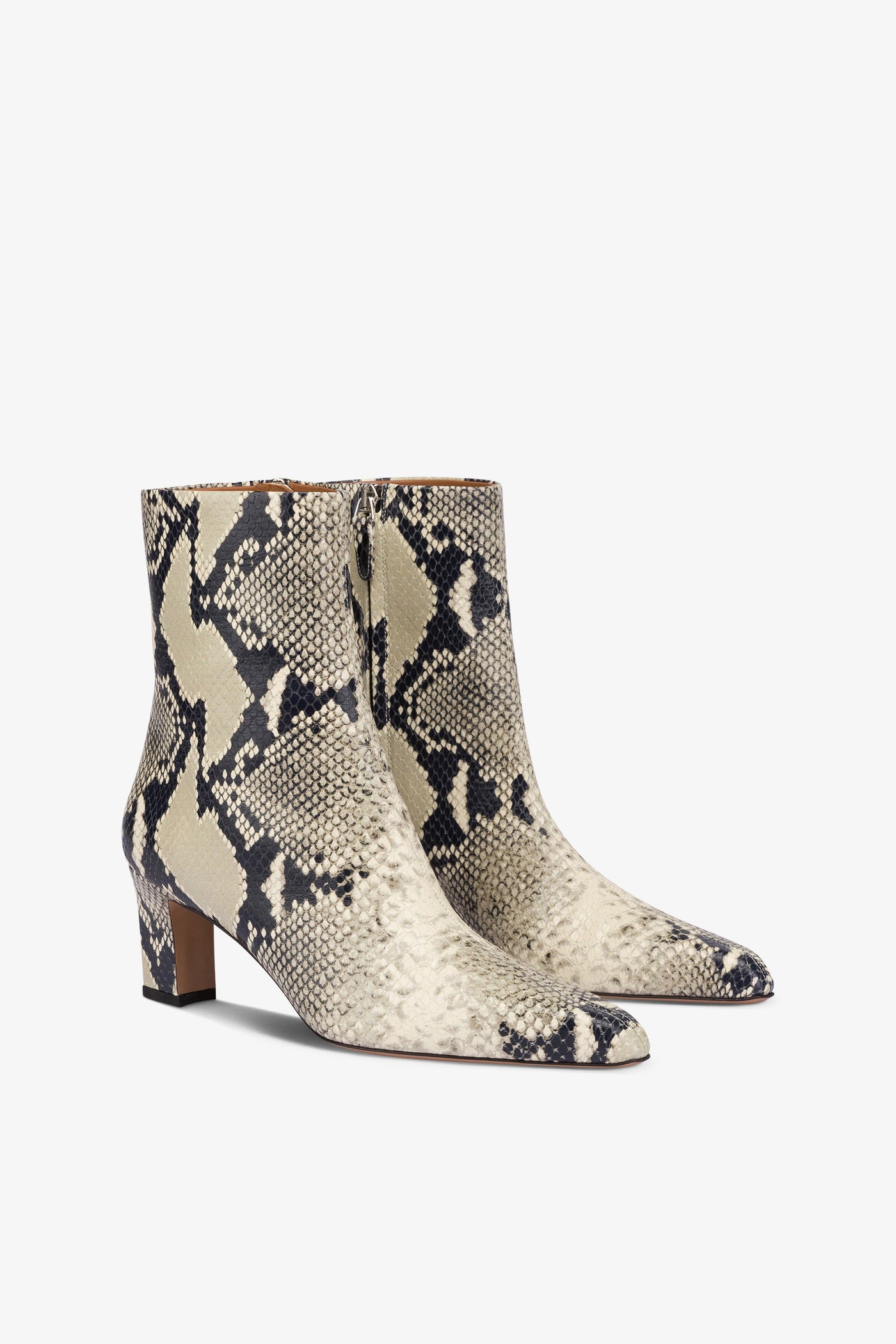 Pointed ankle boots in natural python-printed leather