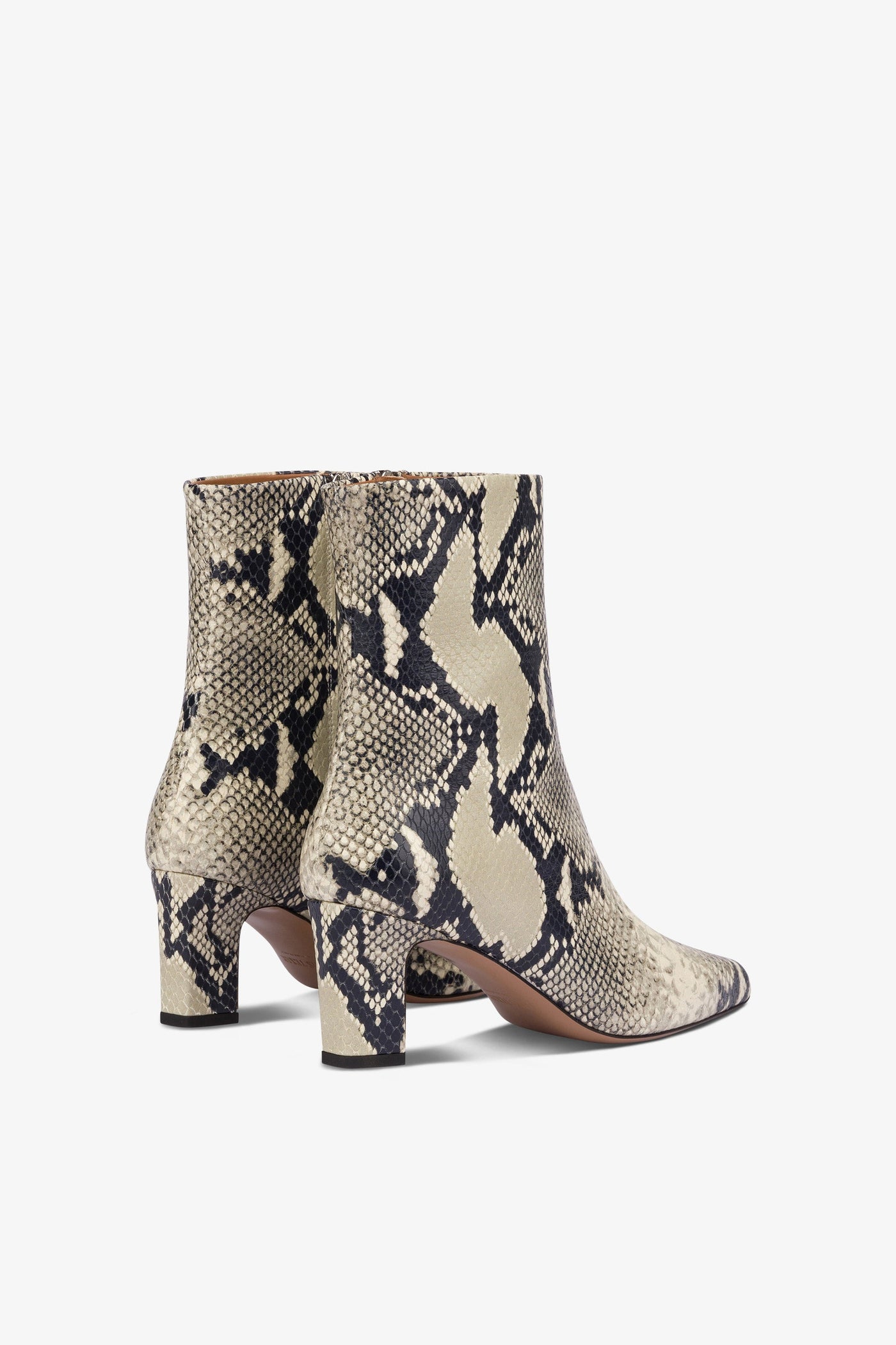 Pointed ankle boots in natural python-printed leather