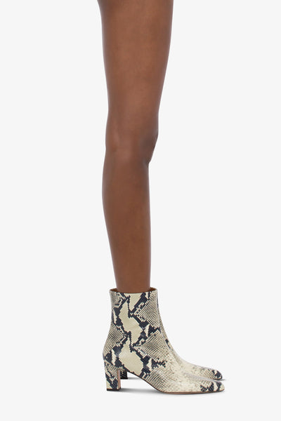 Pointed ankle boots in natural python-printed leather