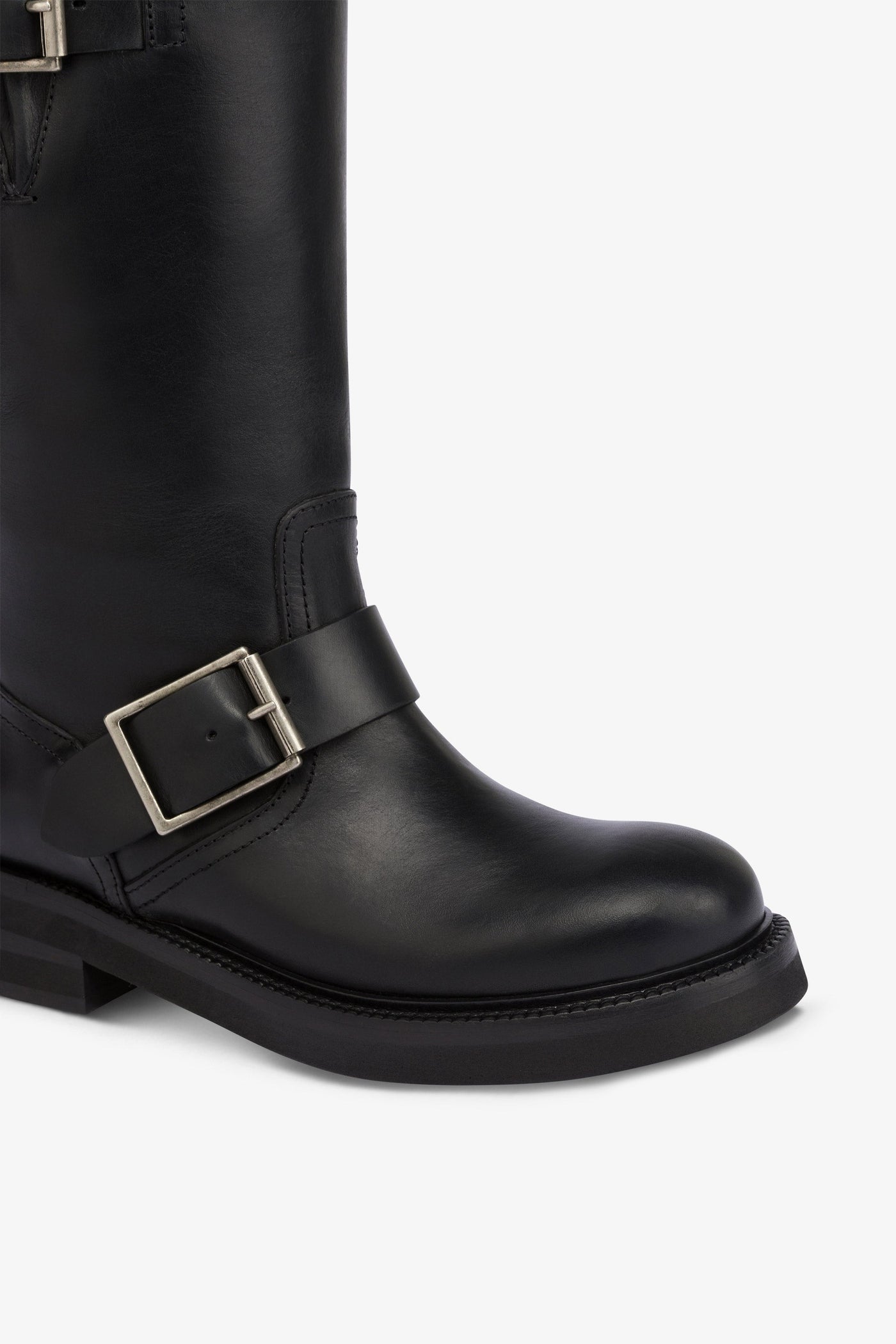 Boots in black brushed leather