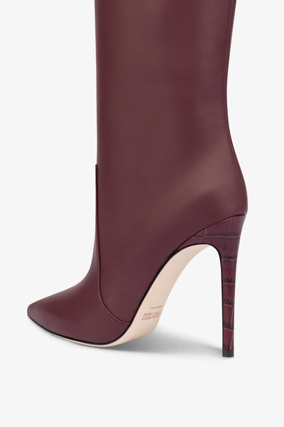 Pointed knee-high boots in smooth burgundy leather