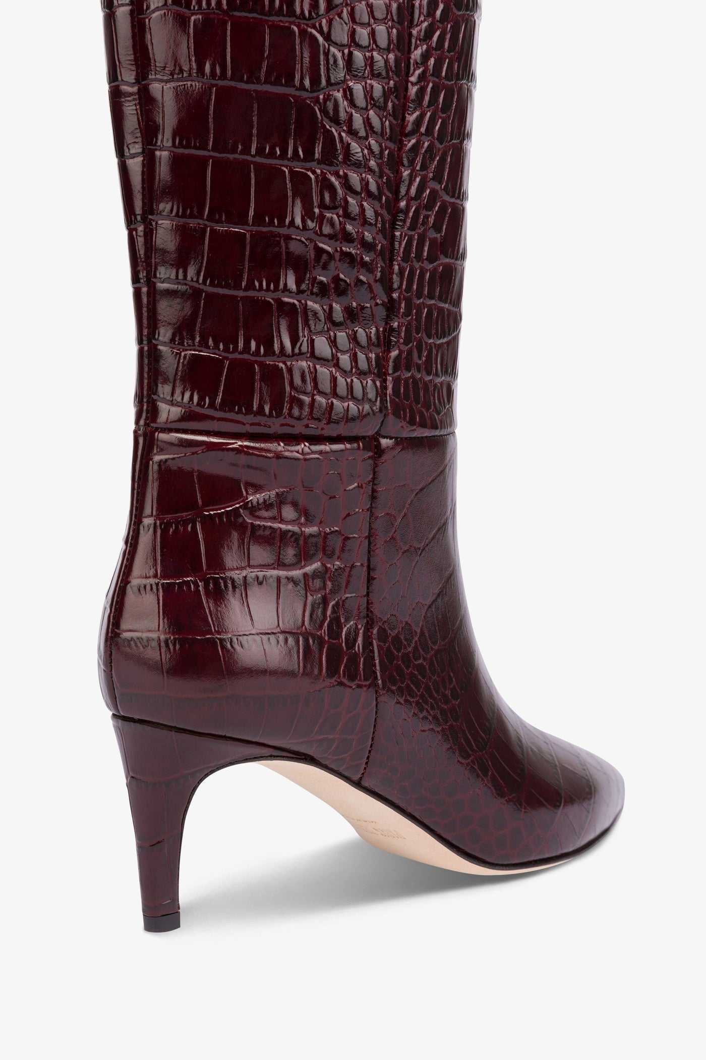 Pointed knee-high boots in rouge noir soft croco-embossed leather