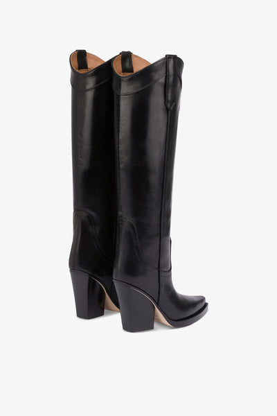 Pointed knee-high boots in black shiny vintage leather