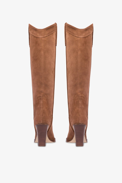 Pointed knee-high boots in smooth dark brown leather