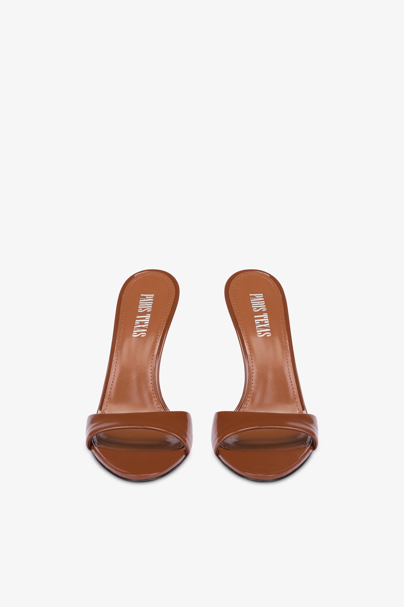 Almond-toe mules in patent brown leather