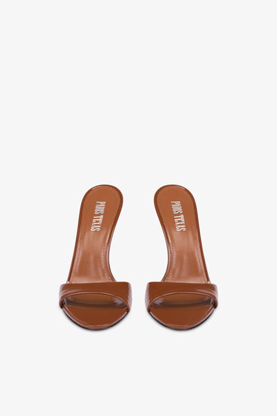 Almond-toe mules in patent brown leather