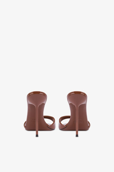 Almond-toe mules in patent brown leather