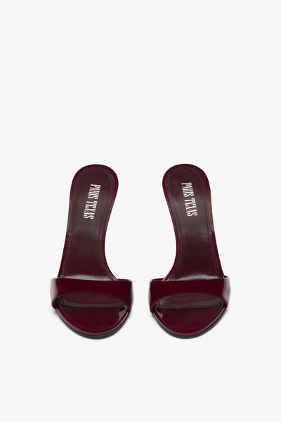 Rouge noir patent leather mules