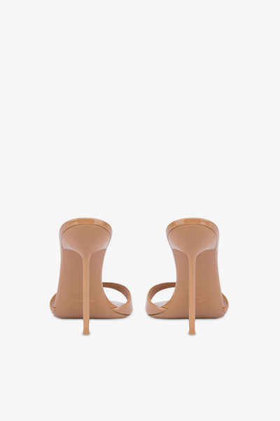 Almond-toe mules in patent caramel leather