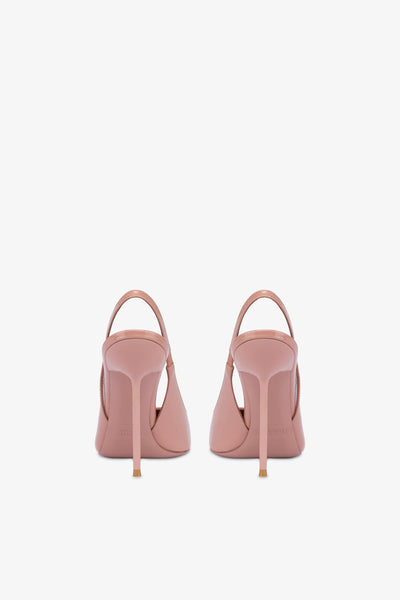 Sharp, pointed slingbacks in patent Texas pink leather